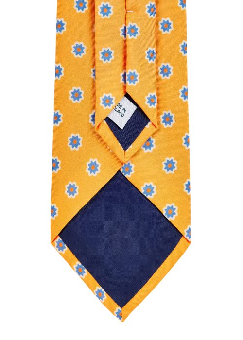 A Roderick Charles silk flower tie in yellow.