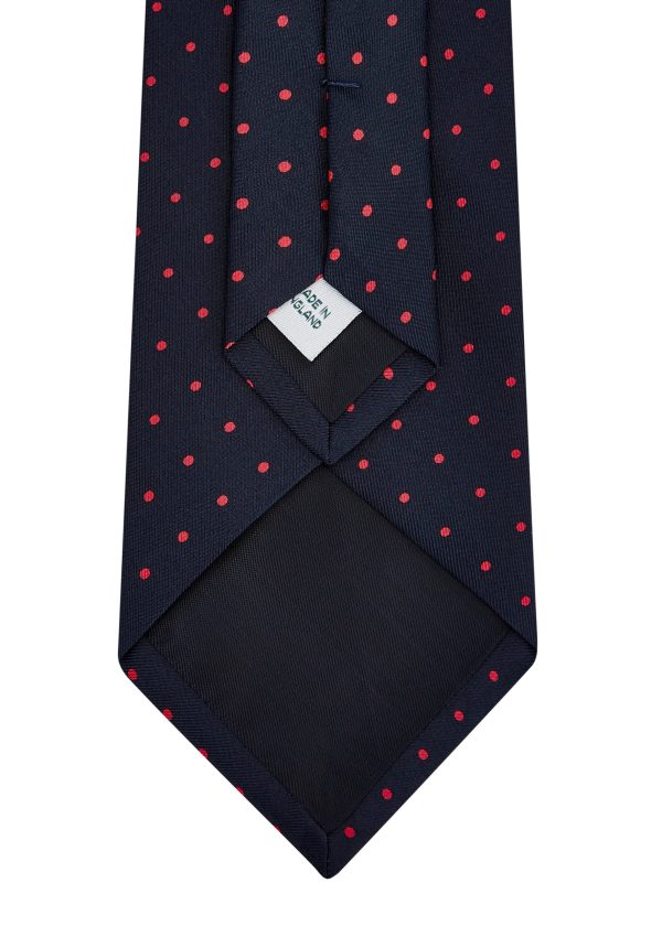 Roderick Charles navy silk tie with red spots.