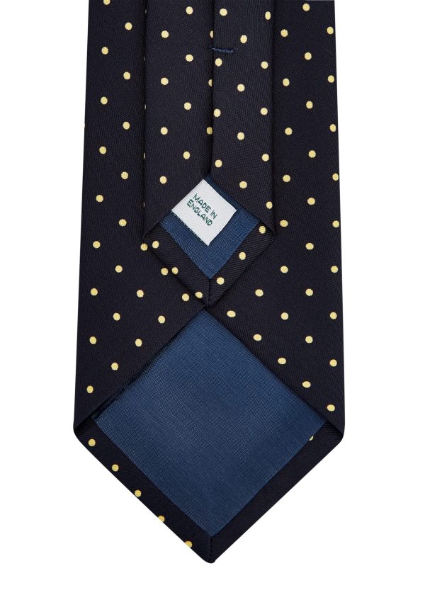Roderick Charles navy silk tie with yellow spots.