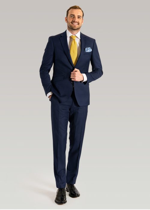 Bertie Wooster navy blue suit styled with yellow tie and white shirt