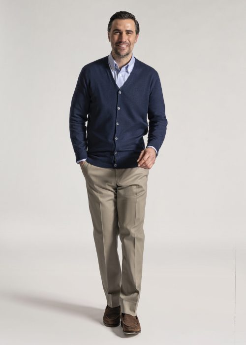 Men's navy merino cardigan styled with suit trousers by Roderick Charles