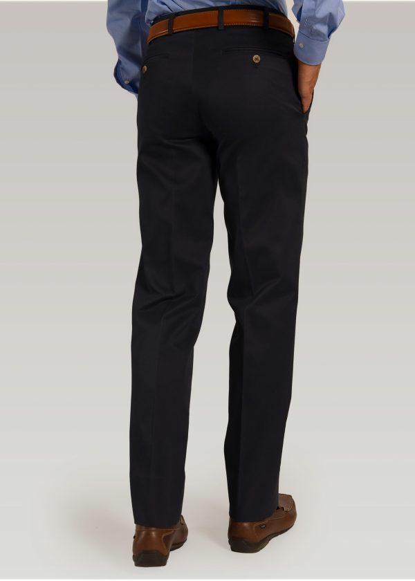 Navy cotton trousers styled with brown leather shoes