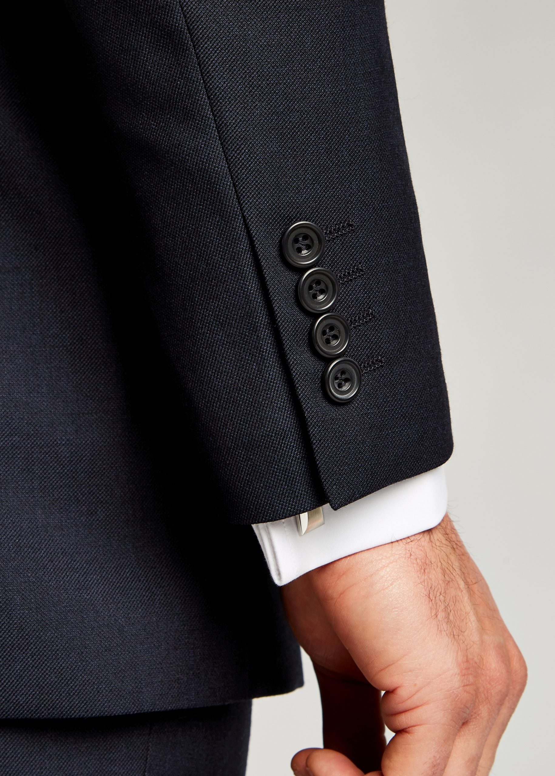 Men’s 4 button cuff suit detail navy suit from London