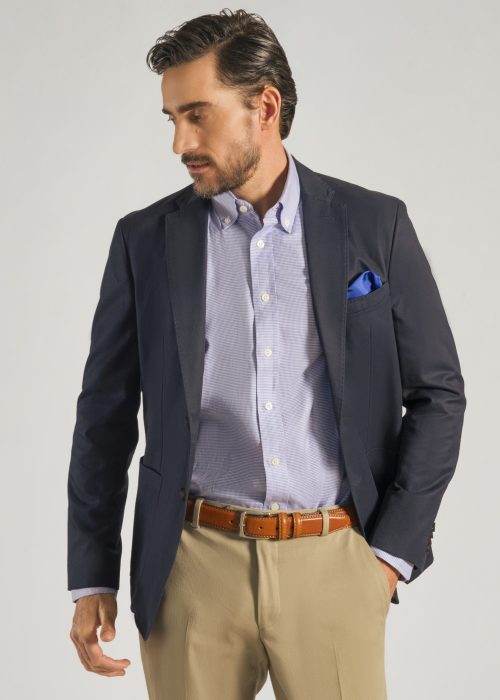 Navy cotton jacket styled with blue silk pocket square