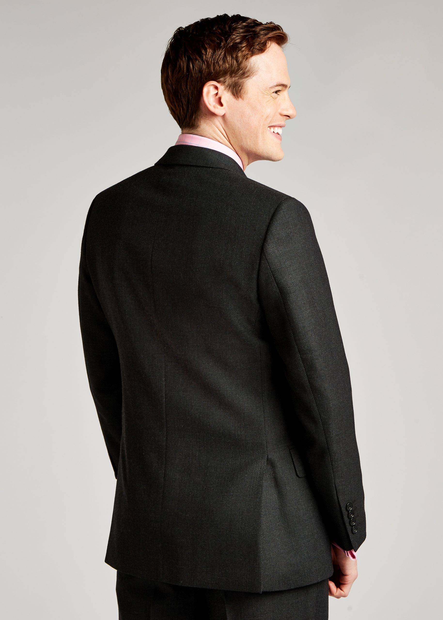 Back view of Roderick Charles tailored fit charcoal suit