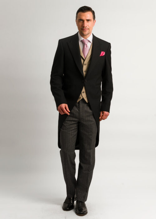 A Roderick Charles morning suit outfit styled with formal tan waistcoat.
