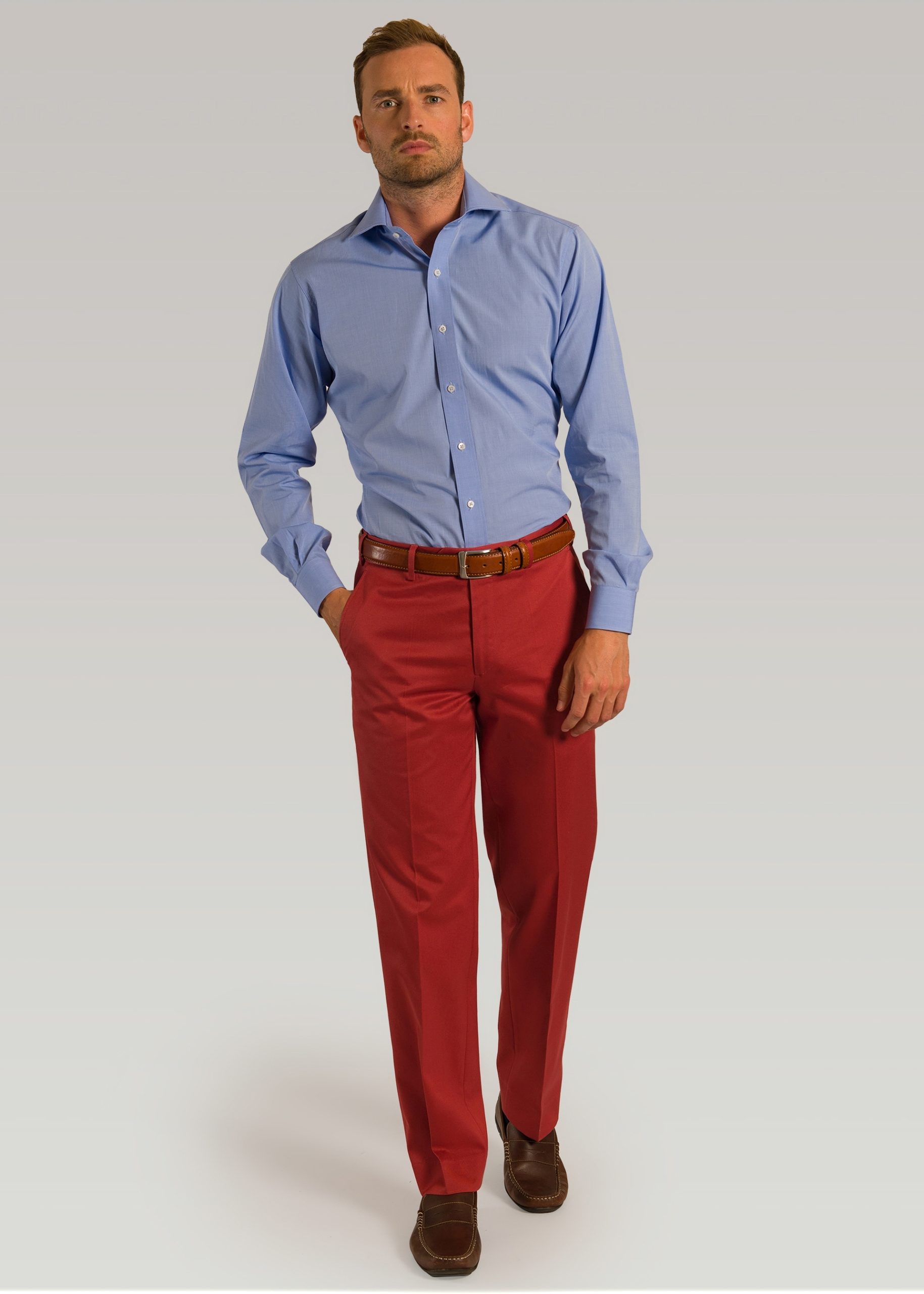 Men’s pink cotton trouser styled with brown leather trousers