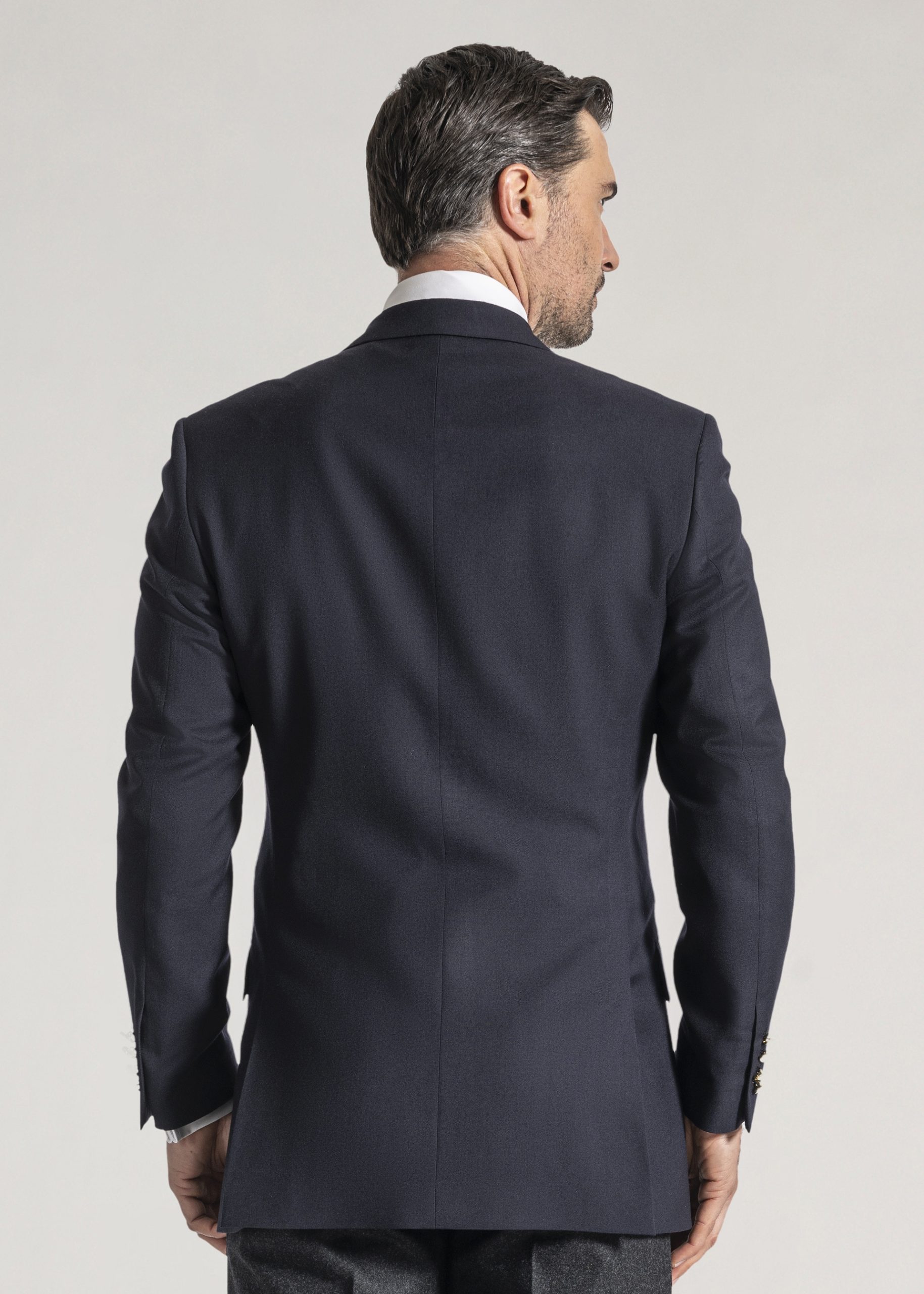 Single breasted navy blazer styled with white shirt