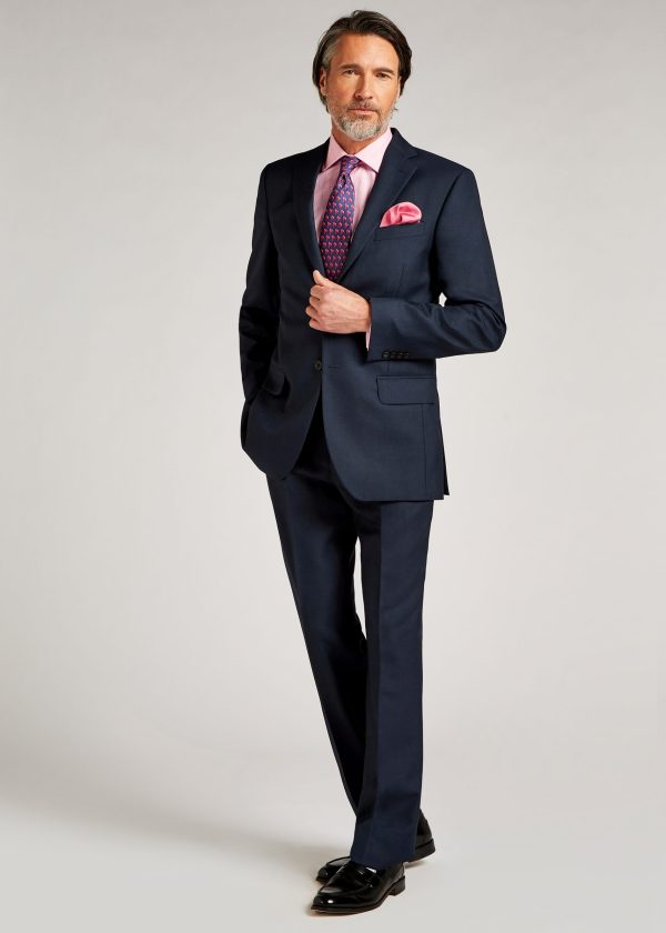 Roderick Charles tailored fit blue pic and pic suit styled with pink shirt