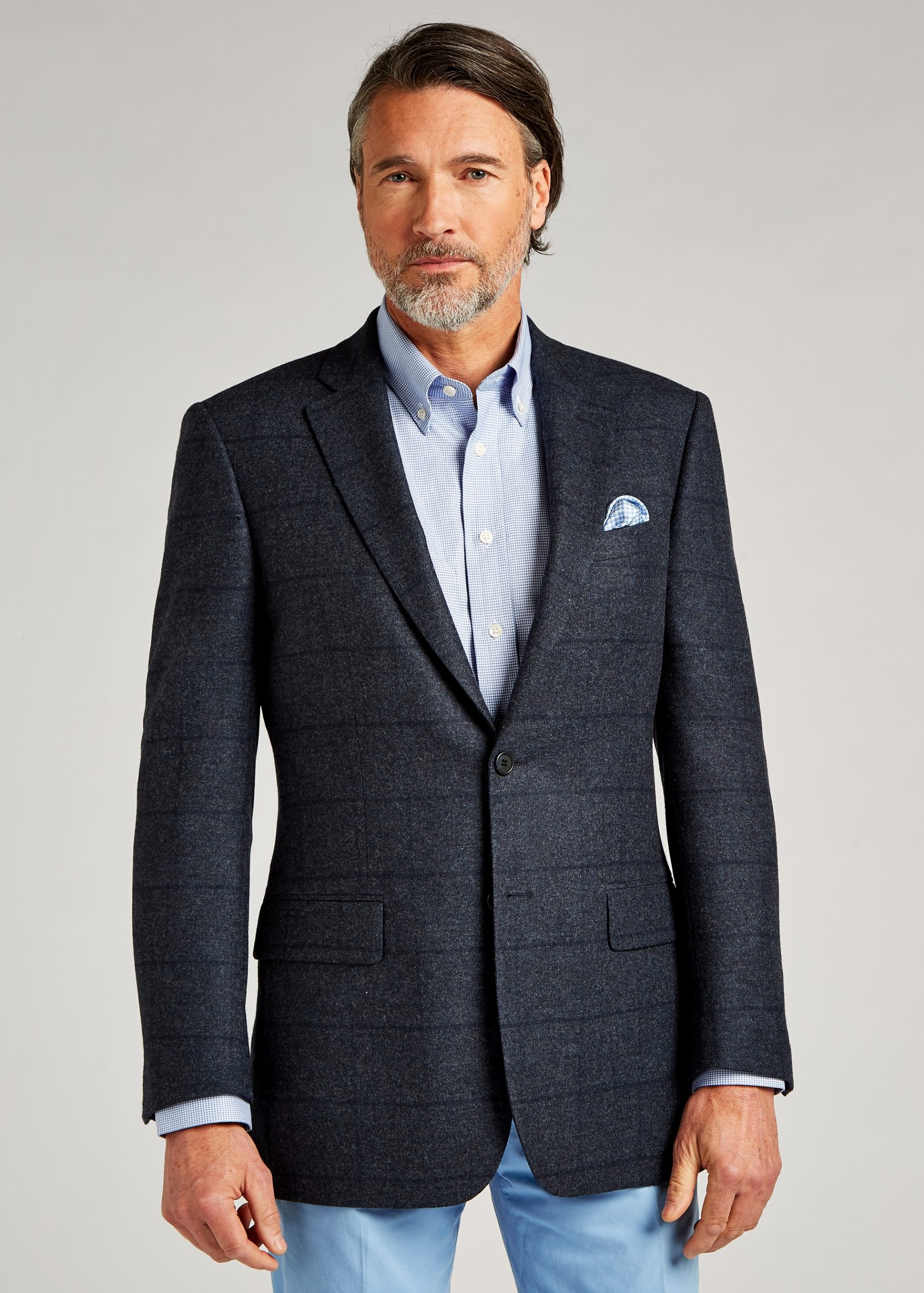 Roderick Charles tailored fit navy blue tweed jacket styled with pale blue silk pocket square