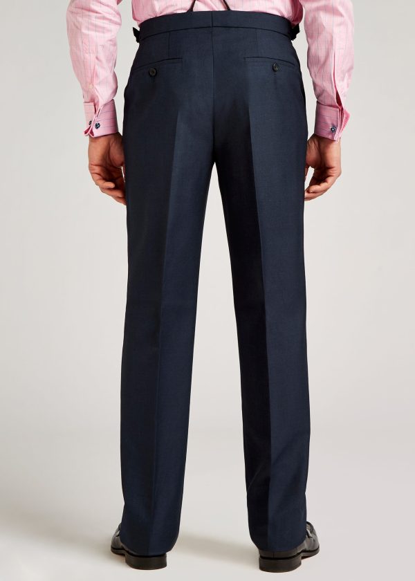 A back view of men's suit trousers in blue