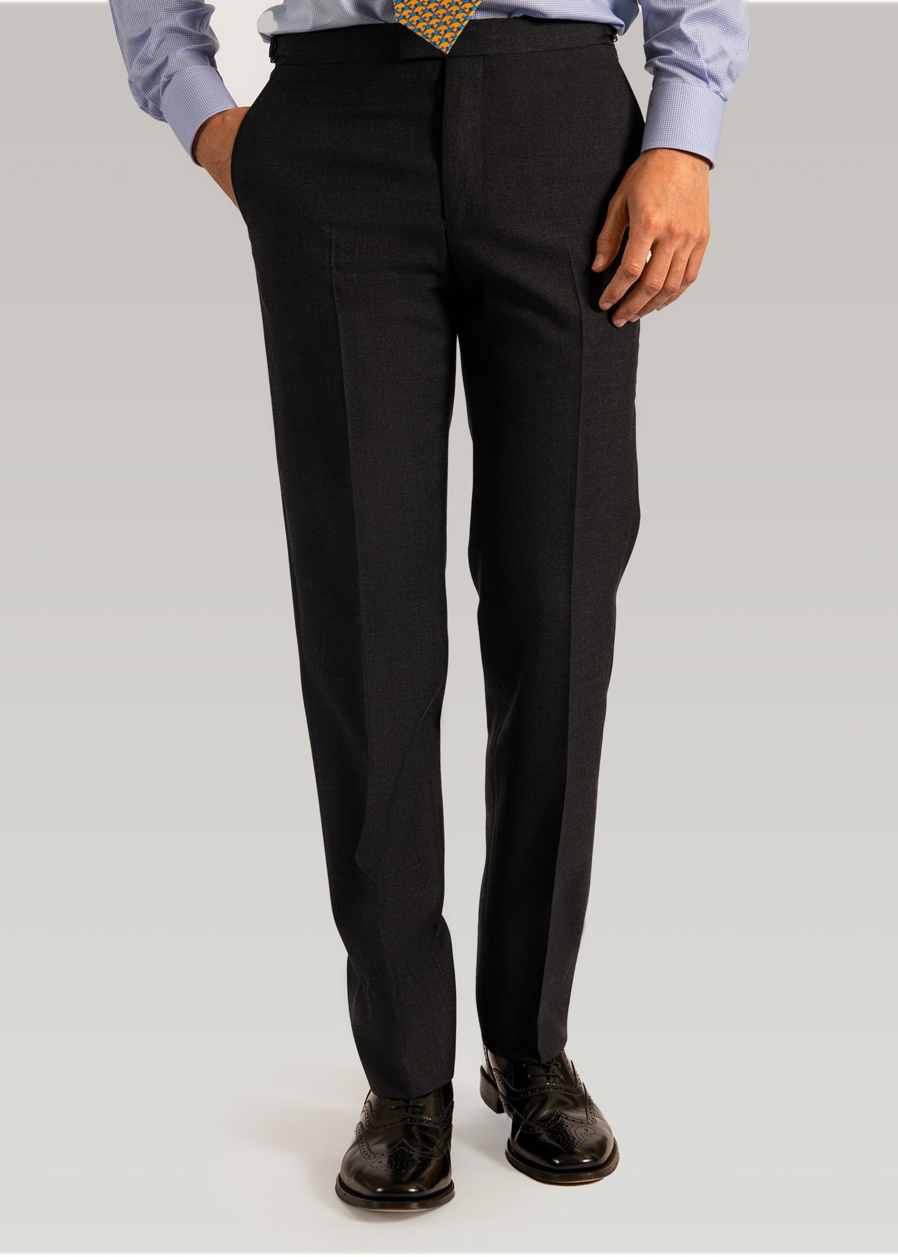 Front of Men’s pleat suit trousers in grey