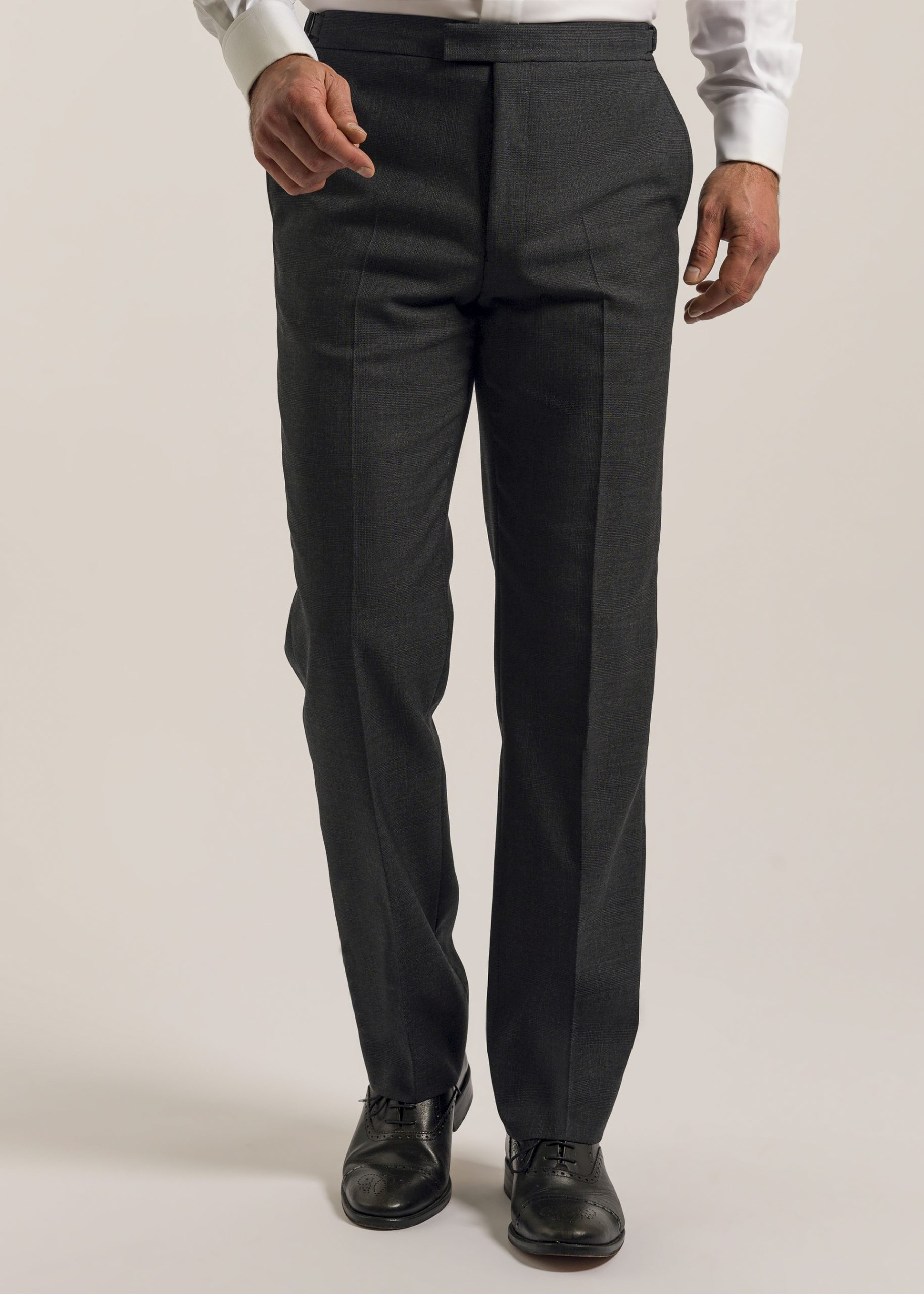 Front of men’s formal suit trousers in grey glen check