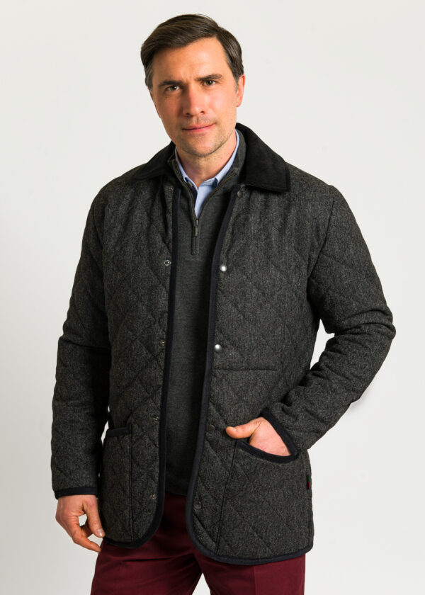 A grey quilted jacket for men perfect for the weekend and layering over sweaters.