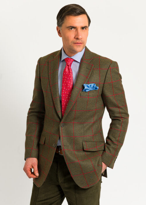 A tweed windowpane men's jacket in green with red over check design.