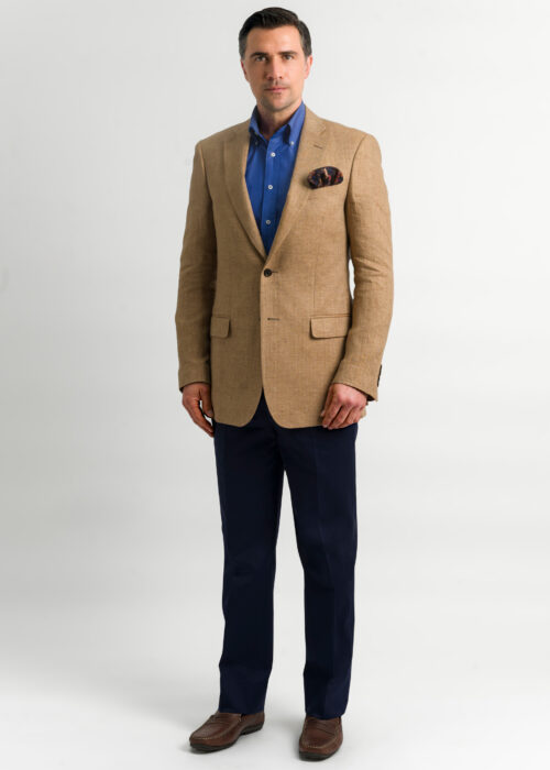 A tan fine herringbone men's linen jacket in a tailored shape.