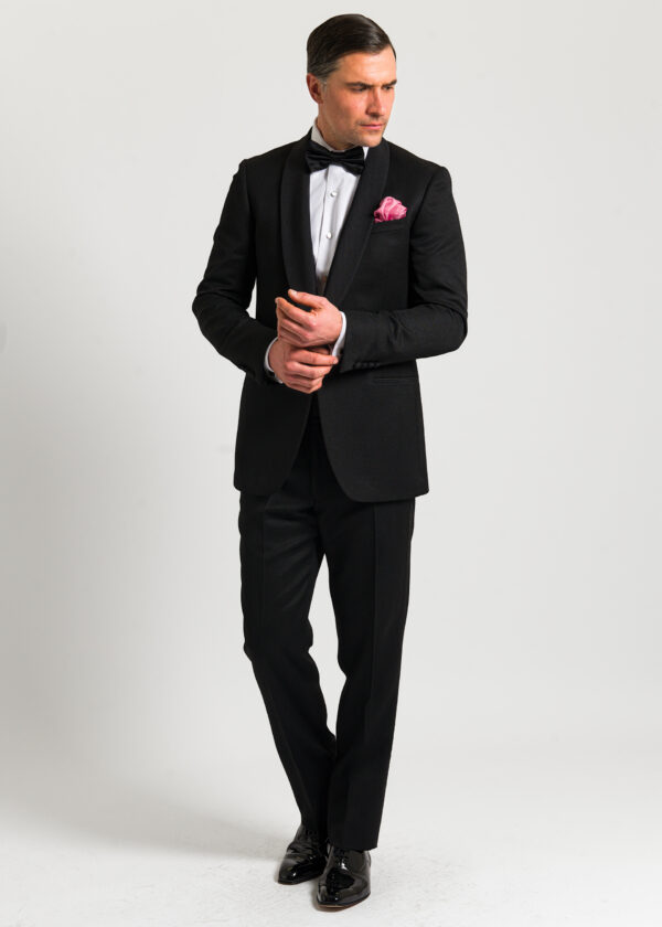 A Roderick Charles black tuxedo with shawl collar.
