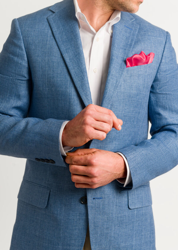 Styled with white shirt and red pocket square, a beautiful men's linen jacket.