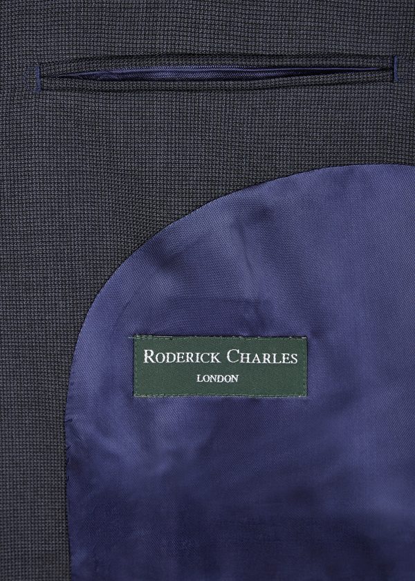 A classic fit blue microcheck London suit, internal pocket by Roderick Charles.