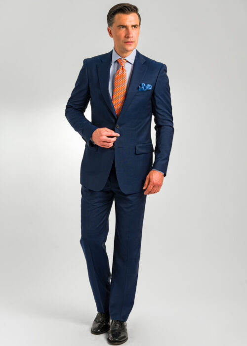 A men's semi plain dark blue lightweight suit.
