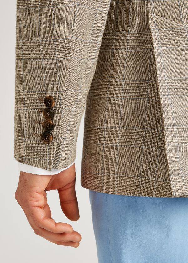 Detail picture of the 4 four button sham-hole sleeve of a Roderick Charles tailored tan linen glen check jacket