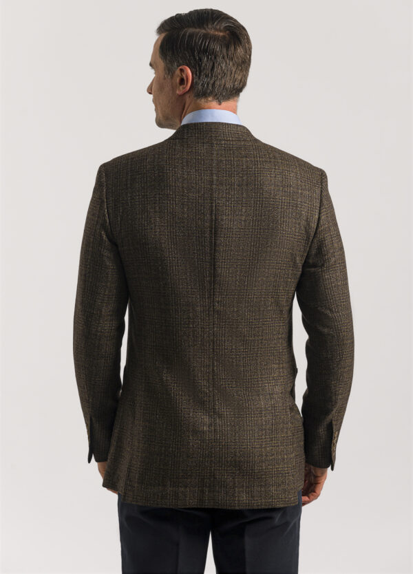 The back of a sophisticated Roderick Charles tailored fit brown and fawn glen check jacket
