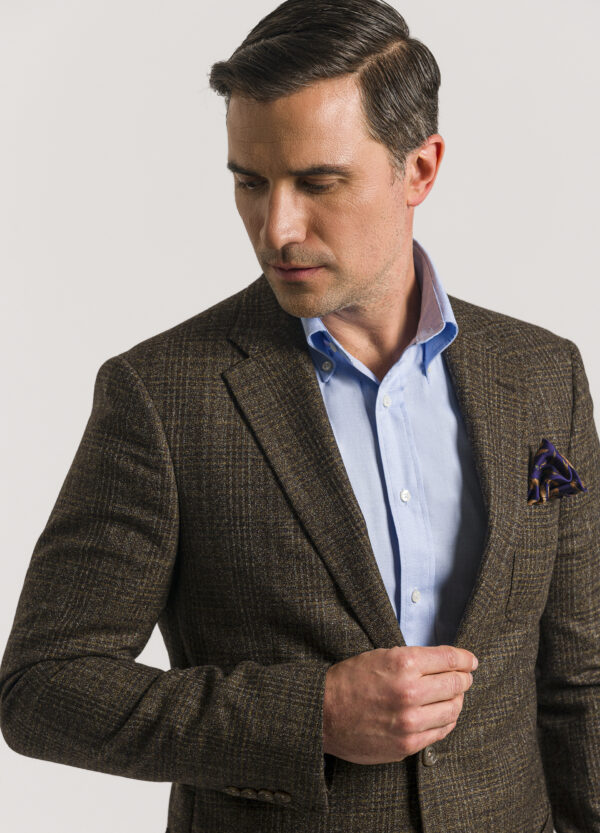 A Roderick Charles tailored fit single-breasted brown and fawn glen check jacket that has a stylishly earthy charm