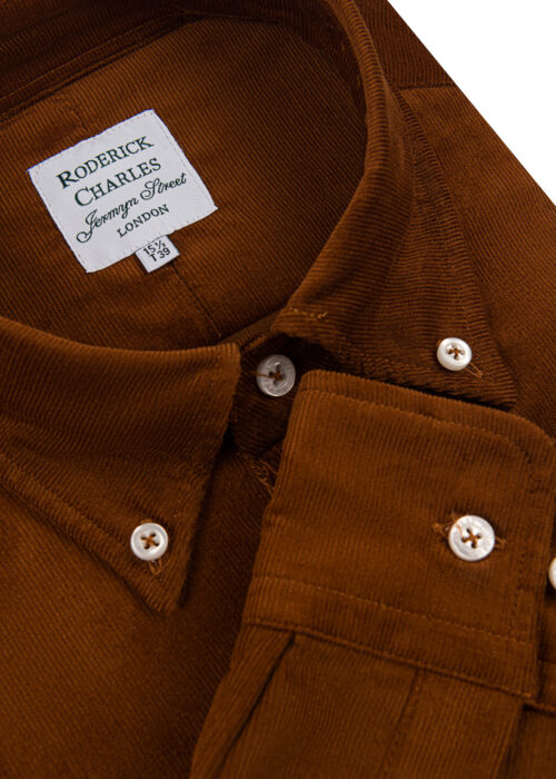 A stylish single-cuff Roderick Charles dark tan corduroy cotton shirt with a button down collar