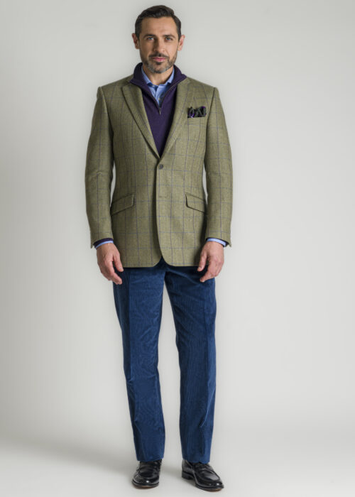A Roderick Charles tweed jacket, featuring a purple and royal blue windowpane check on a herringbone weave, for a subtle pop of colour
