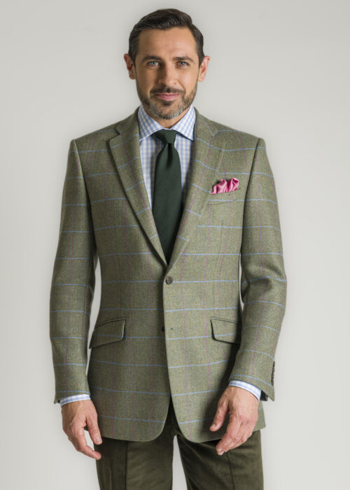 A tailored fit Roderick Charles classic-style tweed jacket, which has a sky and pink windowpane check and a herringbone weave
