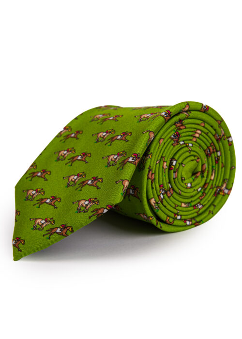 A rolled up Roderick Charles green silk tie depicting horse racing horses and jockeys