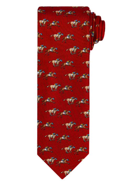 A Roderick Charles red silk tie depicting horse racing horses and jockeys