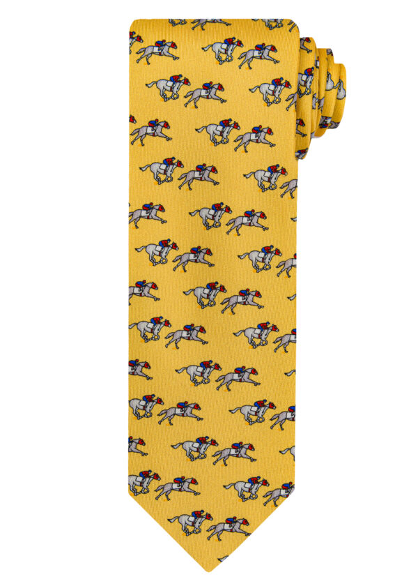 A Roderick Charles yellow silk tie depicting horse racing horses and jockeys