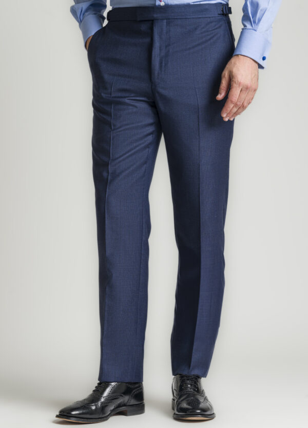 A pair of flat-front trousers from a tailored Roderick Charles dark blue pinhead suit