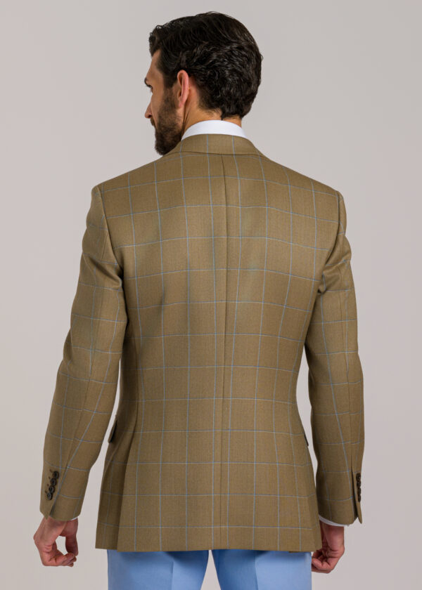 The back of a Roderick Charles tan wool jacket with a dual-tone blue windowpane check